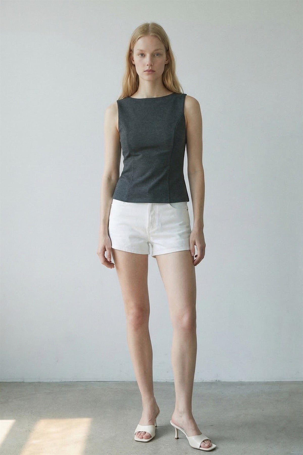 Stretch Knit Sleeveless Peplum Top