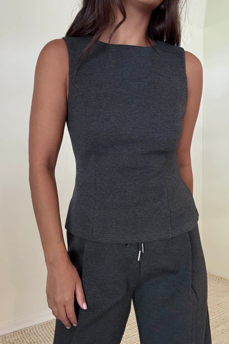 Stretch Knit Sleeveless Peplum Top