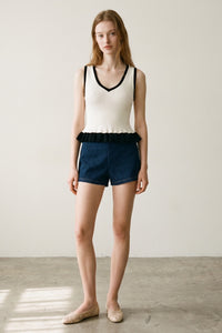 Contrast Ruffle Pointed Hem Knit Top