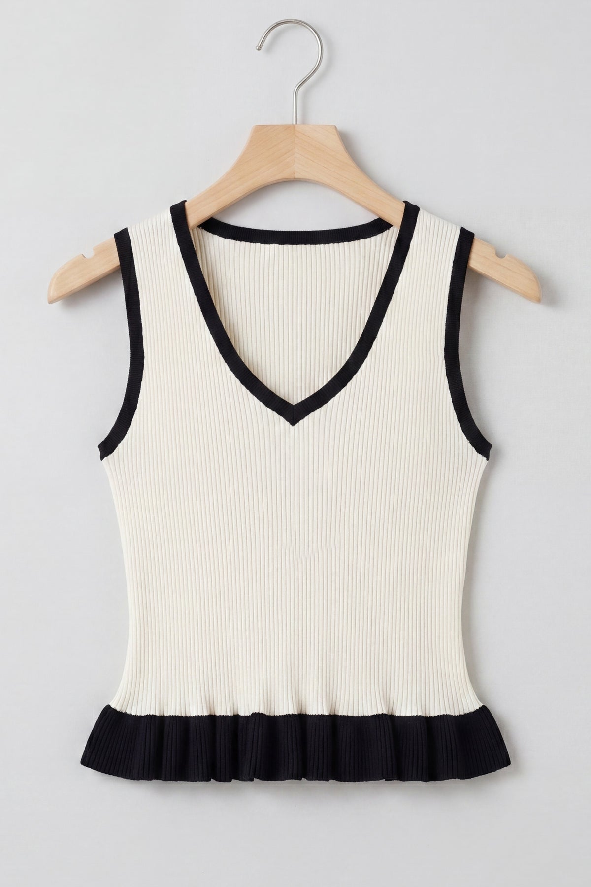 Contrast Ruffle Pointed Hem Knit Top